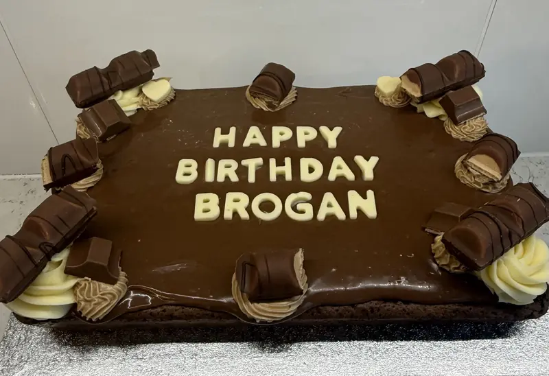 Rich chocolate brownie cake with ganache topping